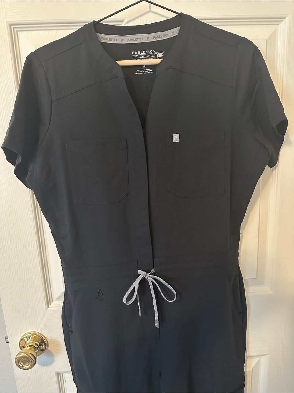 Fabletics Black Utility Scrub Jumpsuit with Gray Drawstring - Picture 4 of 11